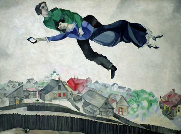 Des smartphones dans des classiques de la peinture au dessus de la ville chagall au-dessus-de-la-ville-chagall