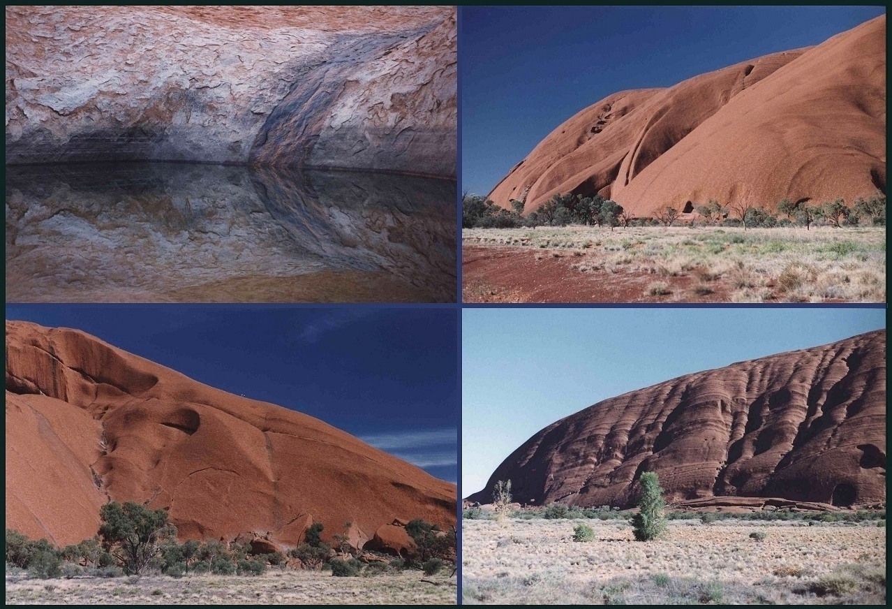 Eau et formations rocheuses au pied d’Uluru Eau accumulée au pied des formations rocheuses d’Uluru après le ruissellement