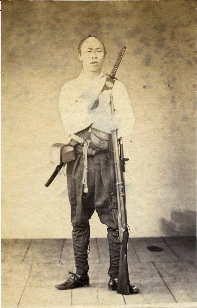 Samouraï japonais avec mousquet et sabre Samouraï japonais armé d’un mousquet et d’un sabre dans les années 1860