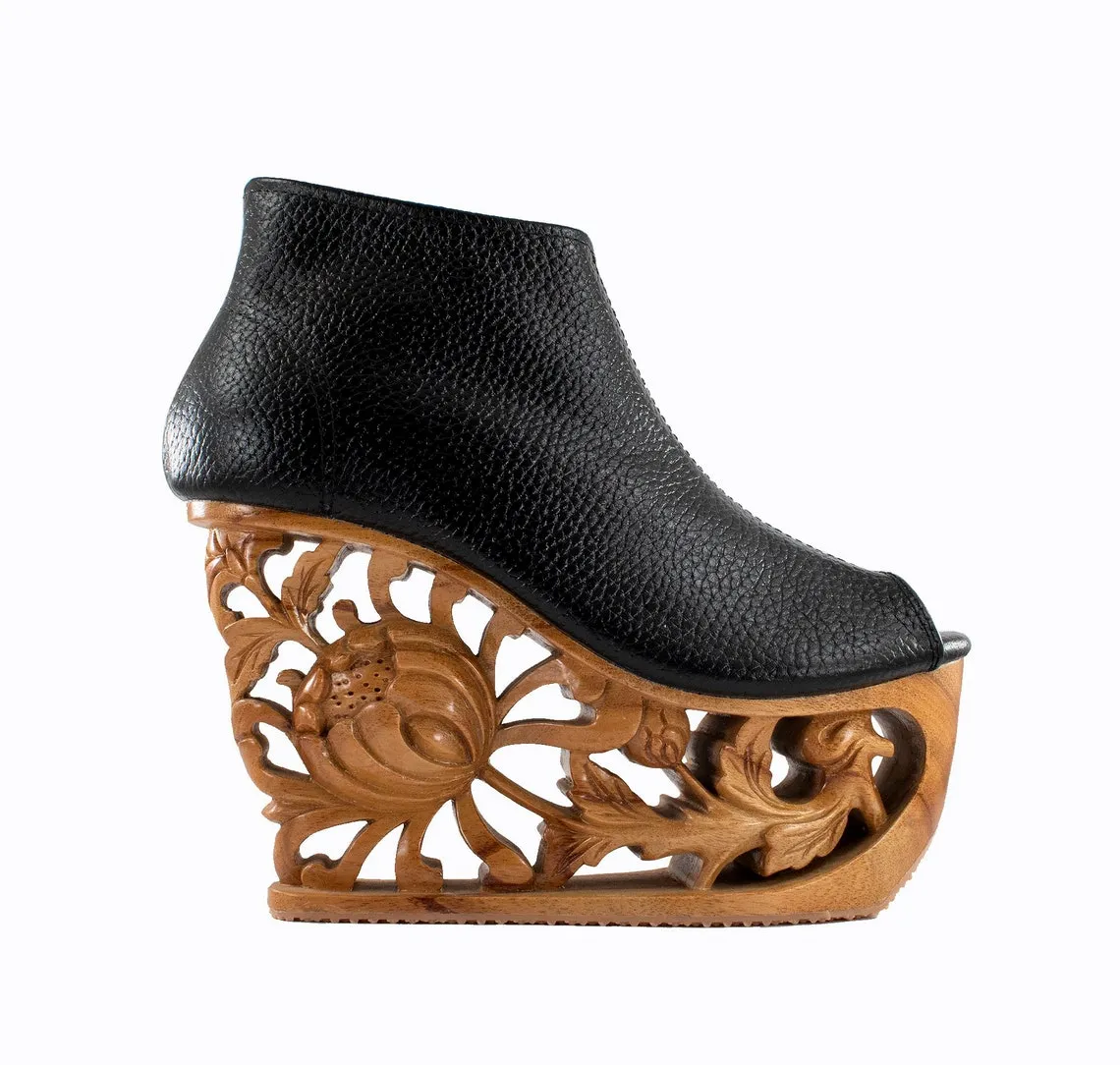 Des chaussures aux semelles de bois sculptées chaussures aux semelles de bois sculptees concues par LanVy Nguyen 11 chaussures-aux-semelles-de-bois-sculptees-conçues-par-LanVy-Nguyen-11