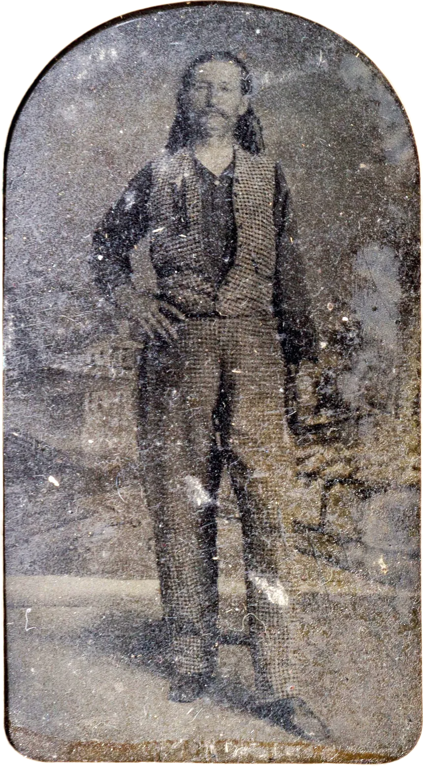 Wild Bill Hickok photographié en pied vers 1870 avec ses longs cheveux et ses revolvers Wild Bill Hickok photographié en pied vers 1870 avec ses longs cheveux et ses revolvers