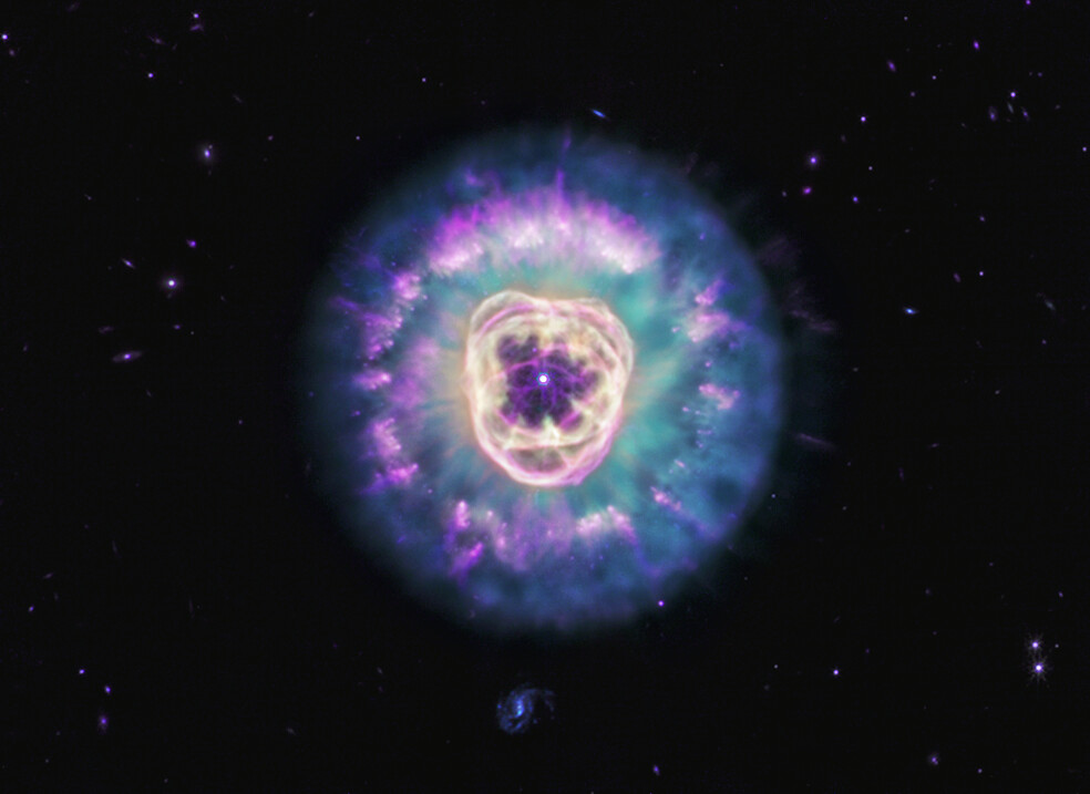 nebuleuse du lion ngc 2392 miri La nébuleuse du Lion NGC 2392 observée avec MIRI par James Webb, montrant une crinière cyan et des amas de poussière violets.
